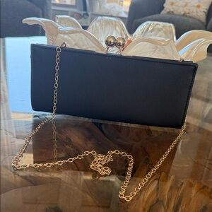 Elegant Black Clutch with Gold Chain